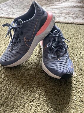Nike Women’s Blue-Gray Running Shoes with Pink Accent